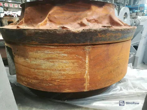 Figure 2: Pre-weld surface preparation and electromagnetic preheating setup for ductile iron roller core — showing heating strip placement on conical weld surface