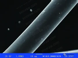 Figure 3: SEM surface morphology of PTFE-coated polyester fiber at varying process conditions