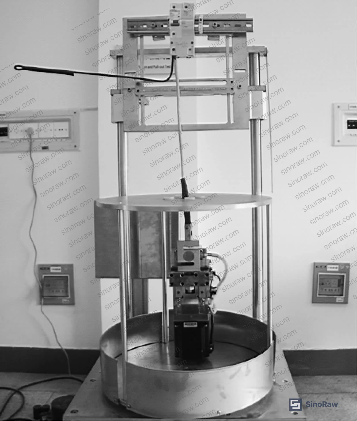 Figure 10: RCCB mounted in the pull-out test apparatus during validation, showing conductor axial alignment with the force application axis